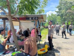 Personel Pospam Amahami Laksanakan Patroli di Tempat Wisata Pantai Lawata dan Wadumbolo