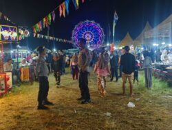 Polres Loteng Amankan Festival Pasar Malam Rona-Rona di Lapangan Peseng